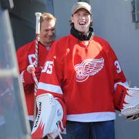 Red Wings goaltender Jimmy Howard smiles as he exits the tunnel and makes his way onto the field at Michigan Stadium for a press conference announcing the 2013 Winter Classic on Thursday afternoon. Melanie Maxwell I AnnArbor.com